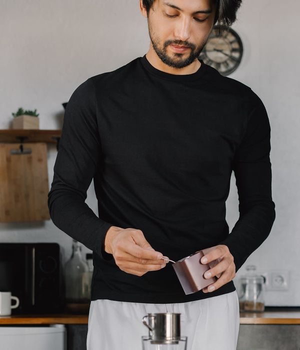 Man meditating after a workout, showing mental focus.